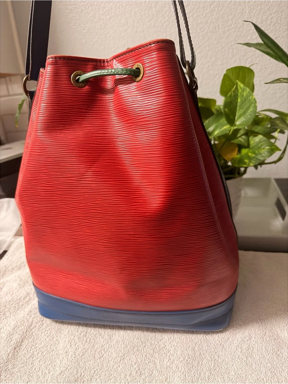 Louis Vuitton Red Leather Drawstring Bucket Bag with Green Cord and Blue Base
